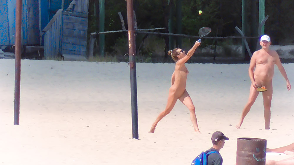 Nude Beach Paddle Ball Rally Between Two Naturists