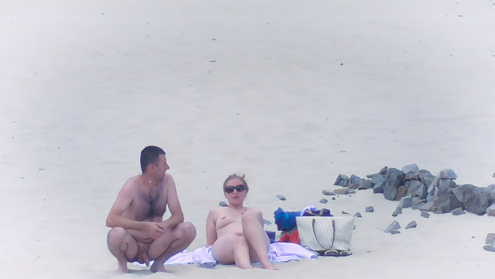 As I told before, my wife is very shy, but we went to a naturist beach and she got nude2