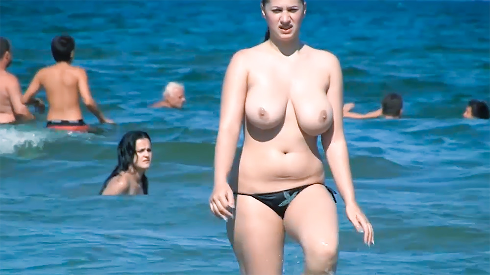 Beautiful nude beach nudist girl secretly filmed by a voyeur enjoying a sunny day 2