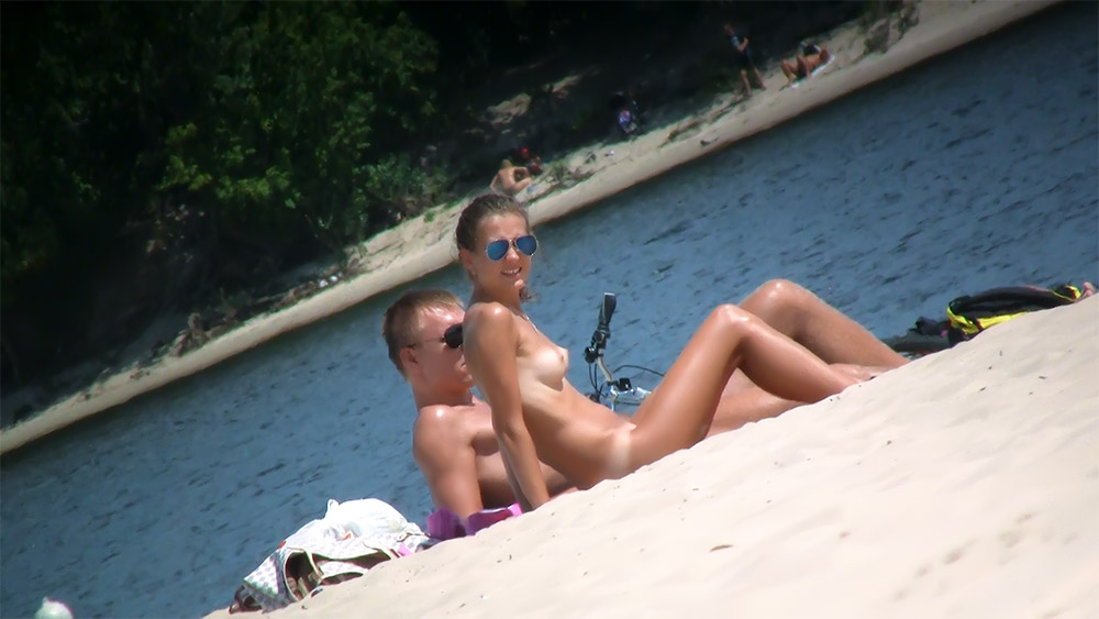 The wife was feeling frisky while we were vacationing in ft. Lauderdale. She put of her skinpiest bikini and we went out to the plage for some fun video. She was definitely viewed by a few different people.