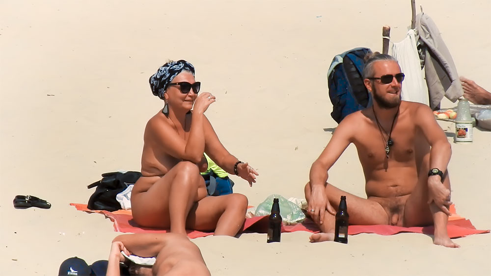 Orange Towel Nude Beach Rest with Sunglasses and Scarf