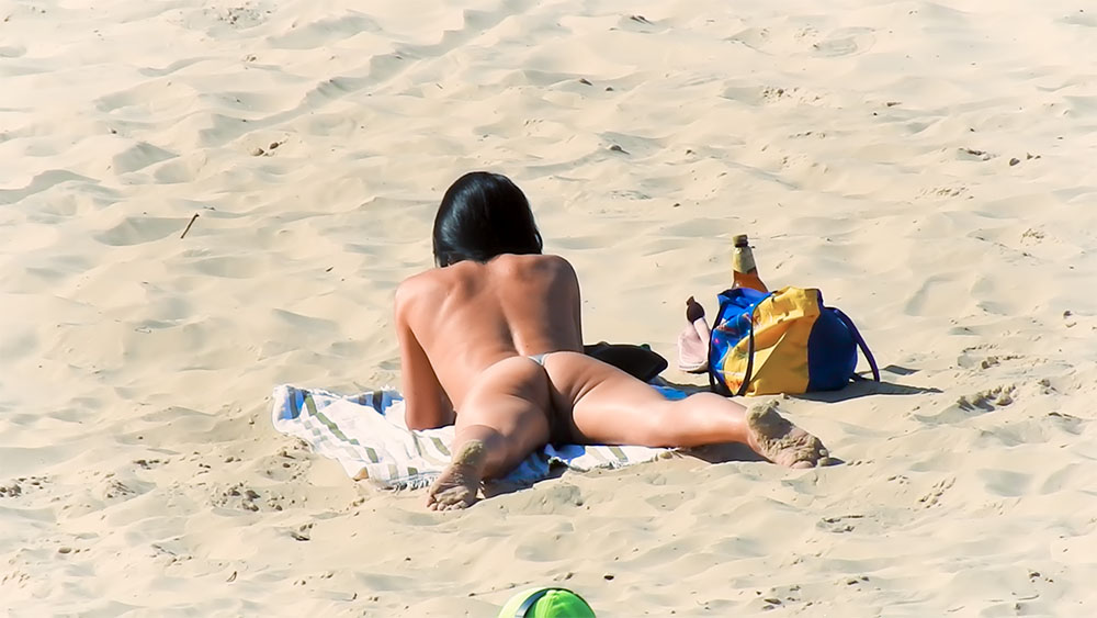 This teen was at the plage every day for a week Difficult to photograph because she rarely left her husband's side.