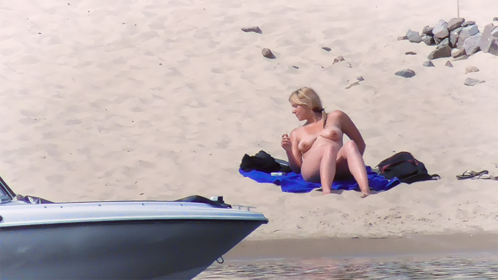 Purple Beach Towel and Sandy Dunes on a Nudist Beach