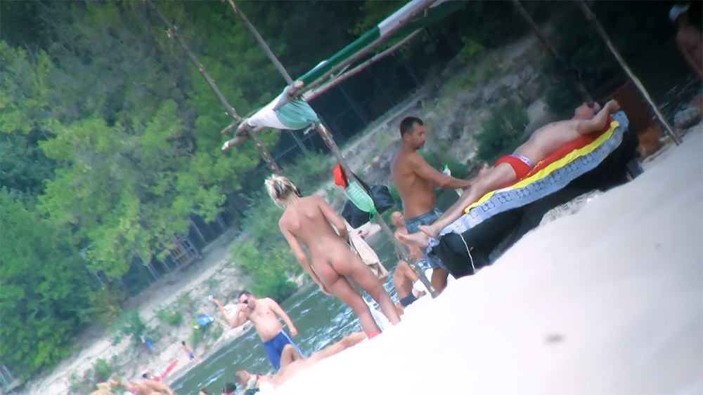 A place where naturism is compulsory on the beach.